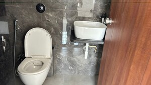 Bathroom in 2 BHK Apartment at Giritirtha Solasta, Ravet – for Rent
