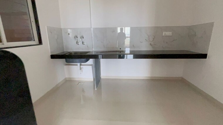 Kitchen, giritirtha-solasta 2 Bedroom 810 Sq.Ft. Apartment In Ravet Pune 10342322