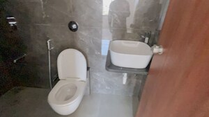 Bathroom in 2 BHK Apartment at Giritirtha Solasta, Ravet – for Rent