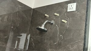 Bathroom in 2 BHK Apartment at Giritirtha Solasta, Ravet – for Rent