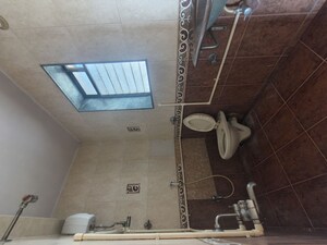 Bathroom in 1 BHK Apartment at Manavsthal Heights, Andheri East – for Rent