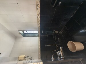 Washroom in 1 BHK Apartment at Manavsthal Heights, Andheri East – for Rent