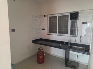 Kitchen in 2 BHK Apartment at Unique K Ville, Ravet – for Rent