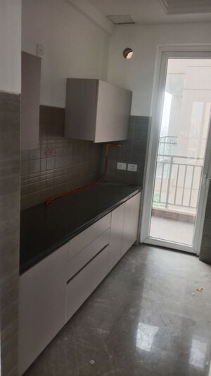 Kitchen in 3 BHK Apartment at Ace Starlit, Sector 152 – for Rent