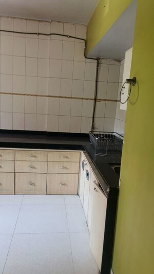 Kitchen in 3.5 BHK Apartment at Cosmos Regency Kavesar, Kavesar – for Rent
