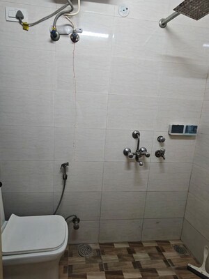Bathroom in 3 BHK Apartment at Arun Vihar, Sector 29 – for Rent