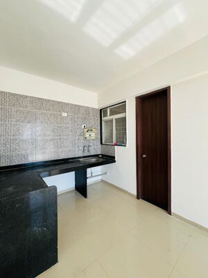 Kitchen in 2 BHK Apartment at Gagan Micasaa, Wagholi – for Rent