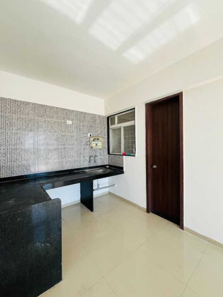 Kitchen, gagan-micasaa 2 Bedroom 780 Sq.Ft. Apartment In Wagholi Pune 10342519