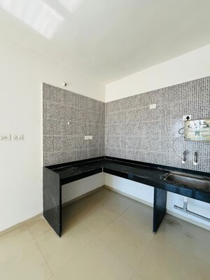 Kitchen in 2 BHK Apartment at Gagan Micasaa, Wagholi – for Rent