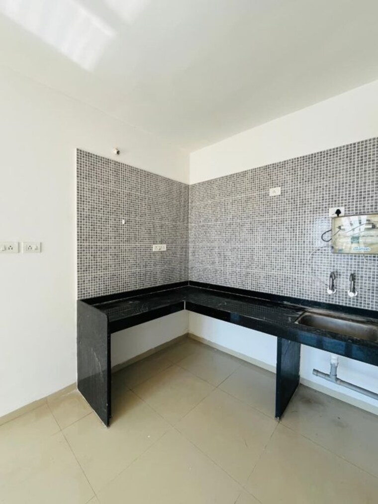 Kitchen, gagan-micasaa 2 Bedroom 780 Sq.Ft. Apartment In Wagholi Pune 10342519