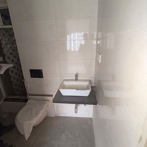 Bathroom in 1 BHK Apartment at Omkar Signet, Malad East – for Rent