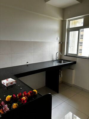 Kitchen in 1 BHK Apartment at Godrej Nirvaan, Themghar – for Rent