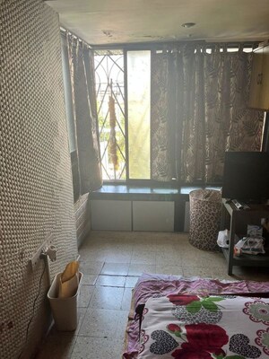 Living Room in 2 BHK Apartment at Adarsh CHS Vasant Vihar, Vasant Vihar – for Sale