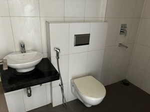 Bathroom in 2 BHK Apartment at Godrej Nirvaan, Themghar – for Rent