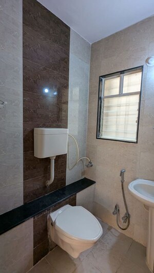 Bathroom in 1 BHK Apartment at Shree Sai Glamour Residency, Ravet – for Rent