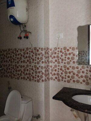 Bathroom in 4 BHK Apartment at Sector 4 Greater Noida – for Rent