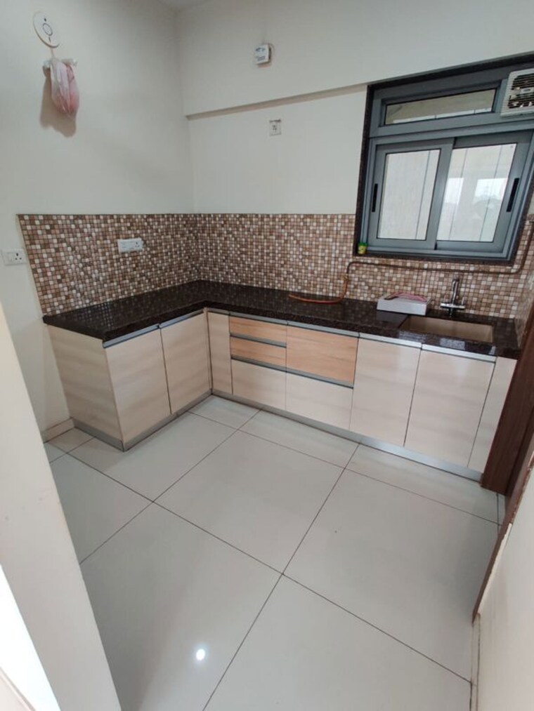 Kitchen, amanora-elivate-tower 2 Bedroom 1154 Sq.Ft. Apartment In Hadapsar Pune 10342862