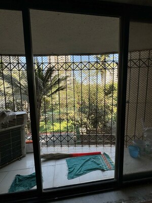 Balcony in 2 BHK Apartment at Dheeraj Godavari Apartment, Malad West – for Rent