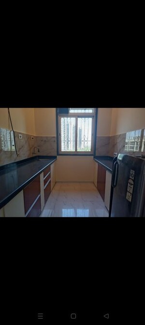 Kitchen in 2 BHK Apartment at Larkins Pride Palms, Kolshet Road – for Rent