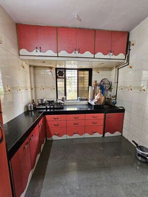Kitchen in 2 BHK Apartment at Ganesh Shraddha CHS, Dombivli East – for Rent