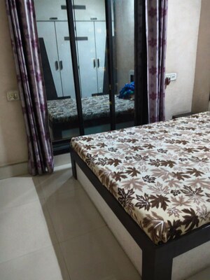 Bedroom in 2 BHK Apartment at Ganesh Shraddha CHS, Dombivli East – for Rent
