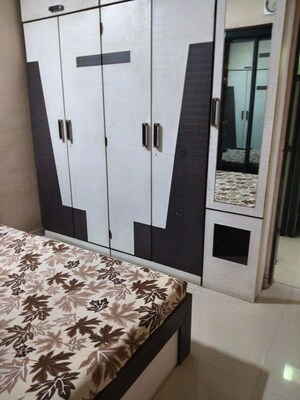 Bedroom in 2 BHK Apartment at Ganesh Shraddha CHS, Dombivli East – for Rent