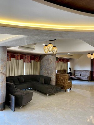 Living Room in 4 BHK Apartment at Tulsi Signature, Belawali – for Sale