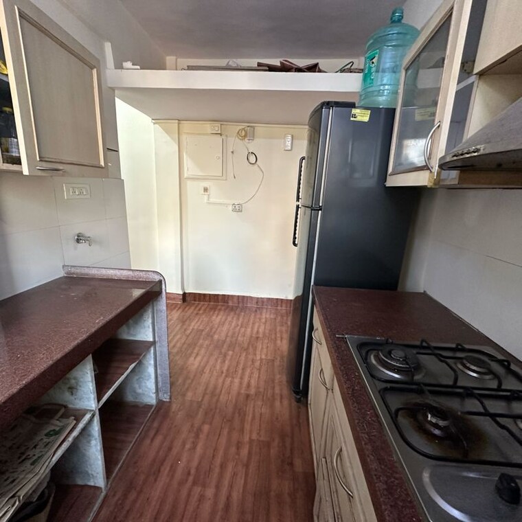 Kitchen, jupiter-apartments-lokhandwala-complex 1 Bedroom 550 Sq.Ft. Apartment In Lokhandwala Complex Mumbai 10343075