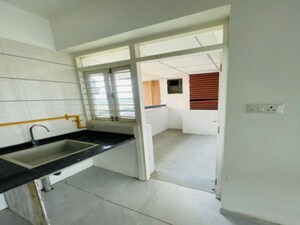 Kitchen in 3 BHK Apartment at Sadhna Skywalk Mangalam, Zundal – for Sale