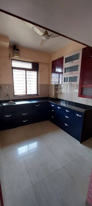 Kitchen in 2 BHK Apartment at Vijay Annex 32, Waghbil – for Rent