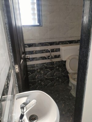 Bathroom in 2 BHK Apartment at Apple Elite, Rahatani – for Sale