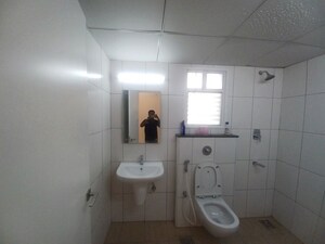 Bathroom in 2.5 BHK Apartment at Godrej Aqua, International Airport Road – for Rent