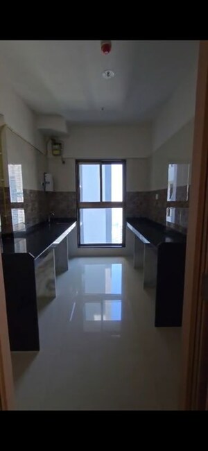 Kitchen in 2 BHK Apartment at Rajesh Raj Infinia, Malad West – for Rent