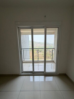 Room in 2 BHK Apartment at Godrej Emerald Vista, Ghodbunder Road – for Sale