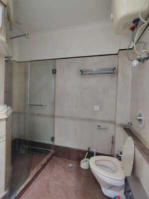 Bathroom in 3 BHK Apartment at Greater Kailash I – for Rent