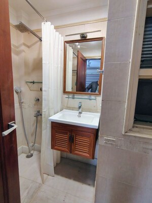 Bathroom in 3 BHK Apartment at Greater Kailash I – for Rent