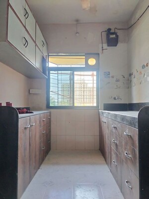 Kitchen in 1 BHK Apartment at Vasant Leela Apartment, Ghodbunder Road – for Rent