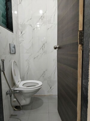 Bathroom in 1 BHK Apartment at Dosti Desire Joy, Brahmand – for Rent