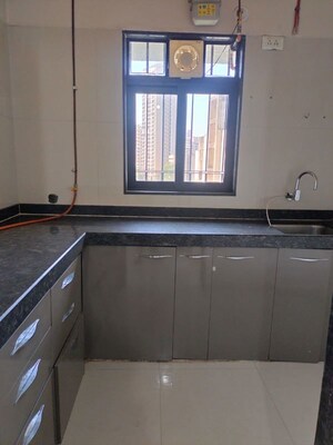 Kitchen in 1 BHK Apartment at Dosti Desire Joy, Brahmand – for Rent