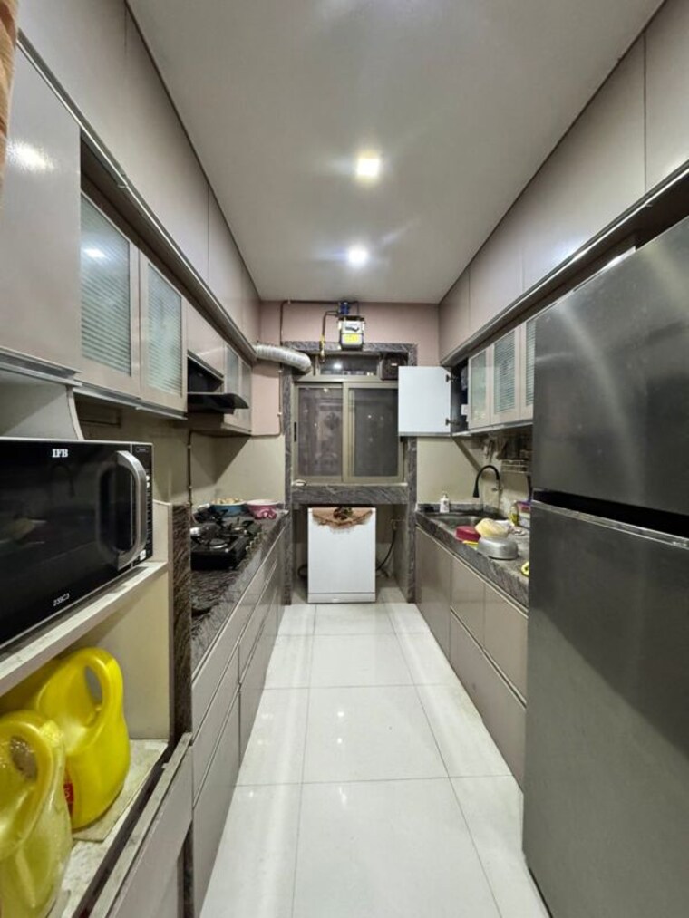 Kitchen, lodha-splendora 3 Bedroom 1300 Sq.Ft. Apartment In Ghodbunder Road Thane 10343310