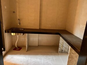 Kitchen in 2 BHK Apartment at Naupada – for Sale