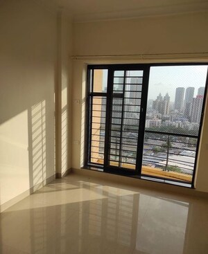 Room in 2 BHK Apartment at K Raheja Heights, Malad East – for Rent