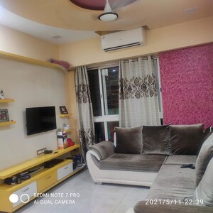 Living Room in 1 BHK Apartment at Lodha Amara, Kolshet Road – for Rent