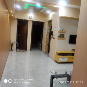 Living Room in 1 BHK Apartment at Lodha Amara, Kolshet Road – for Rent