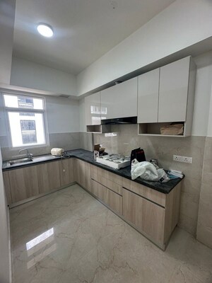 Kitchen in 2.5 BHK Builder Floor at Smart World Orchard, Sector 61 – for Rent