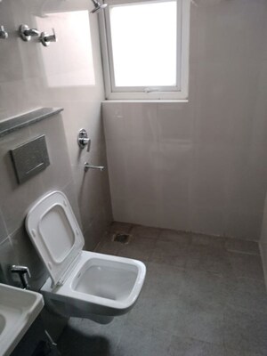 Bathroom in 2.5 BHK Builder Floor at Smart World Orchard, Sector 61 – for Rent