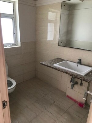 Bathroom in 4 BHK Apartment at DLF New Town Heights III, Sector 91 – for Rent