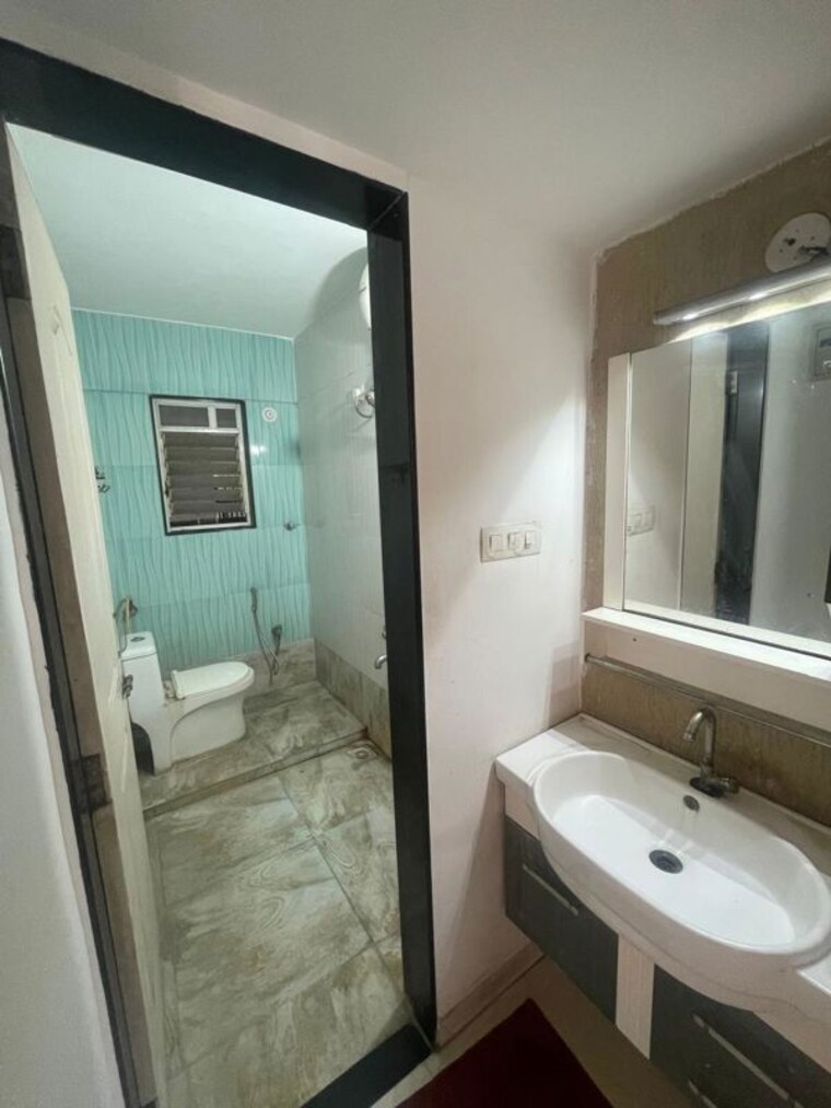 Bathroom, swapnaprasad-ira-florence 2 Bedroom 1059 Sq.Ft. Apartment In Wakad Pune 10343228