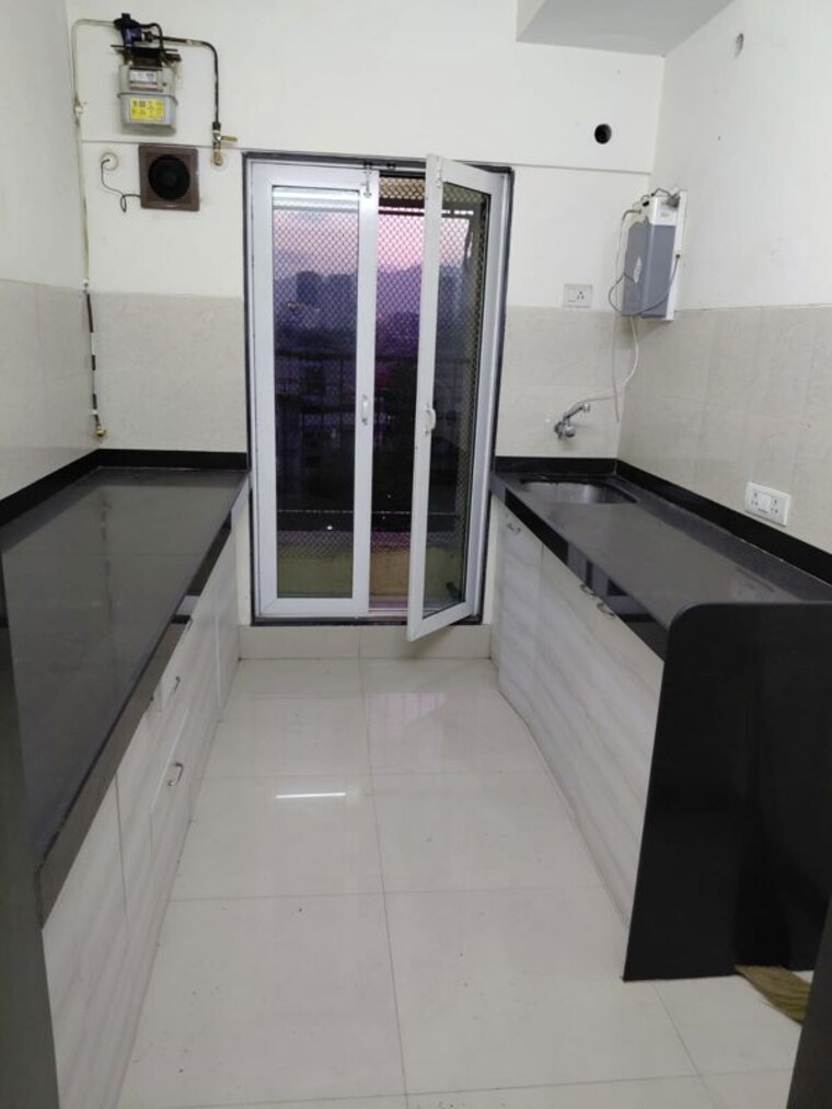 Kitchen, rustomjee-urbania-azziano 2 Bedroom 950 Sq.Ft. Apartment In Thane West Thane 10343550