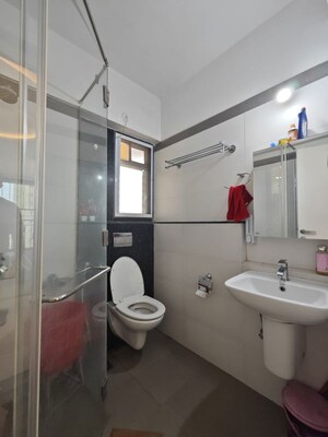 Bathroom in 2 BHK Apartment at Rustomjee Urbania Azziano, Thane West – for Rent